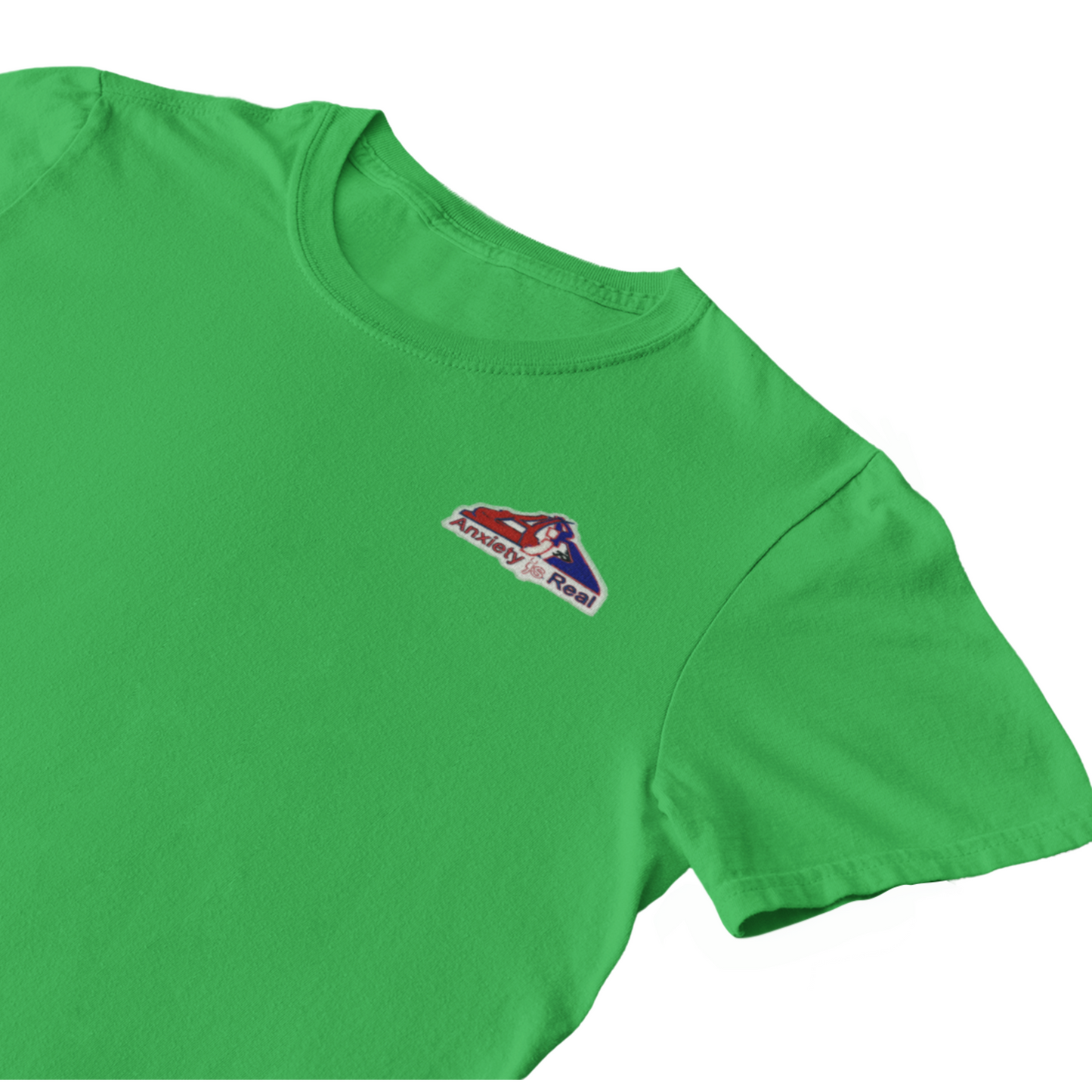 Green cotton short sleeve tshirt with red, navy and white anxiety is real chenille patch on left chest area.