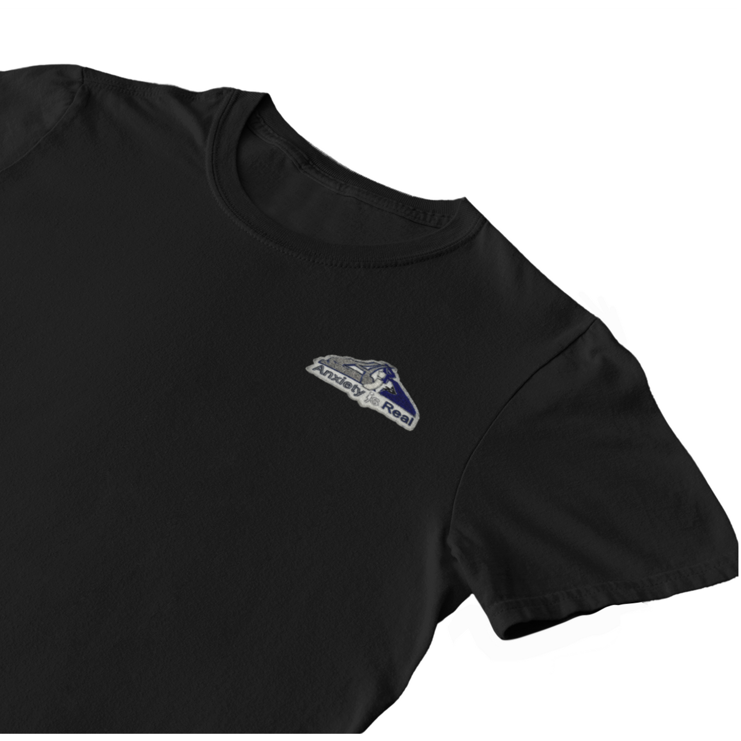Black cotton short sleeve tshirt with grey, navy and white anxiety is real chenille patch on left chest area.